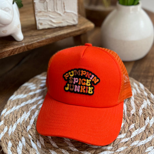 "PUMPKIN SPICE JUNKIE" patch on Bright  Orange Trucker Hat